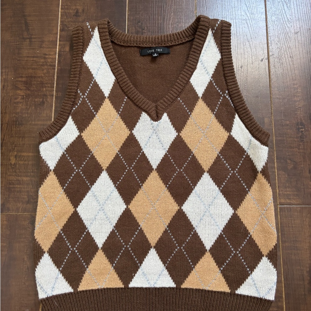 small thrifted brown checkered vest